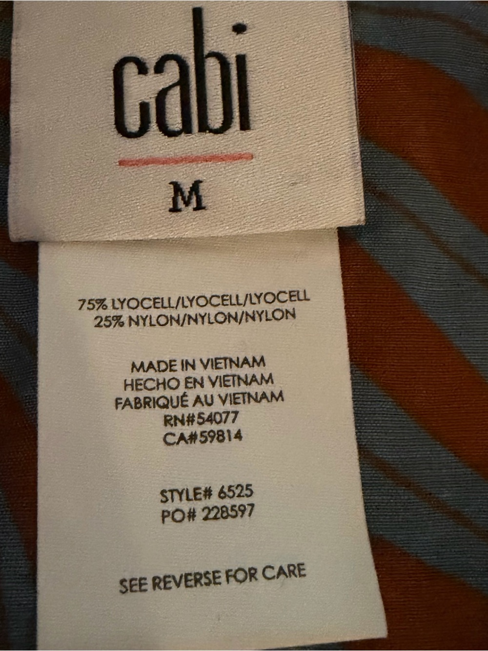 CAbi Sheer Blouse in Rust & Slate Blue Tropical print. - Picture 5 of 8